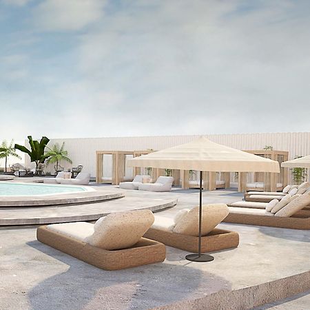 Aelia Luxury Suites Karterados  Exterior photo The rooftop pool at the hotel