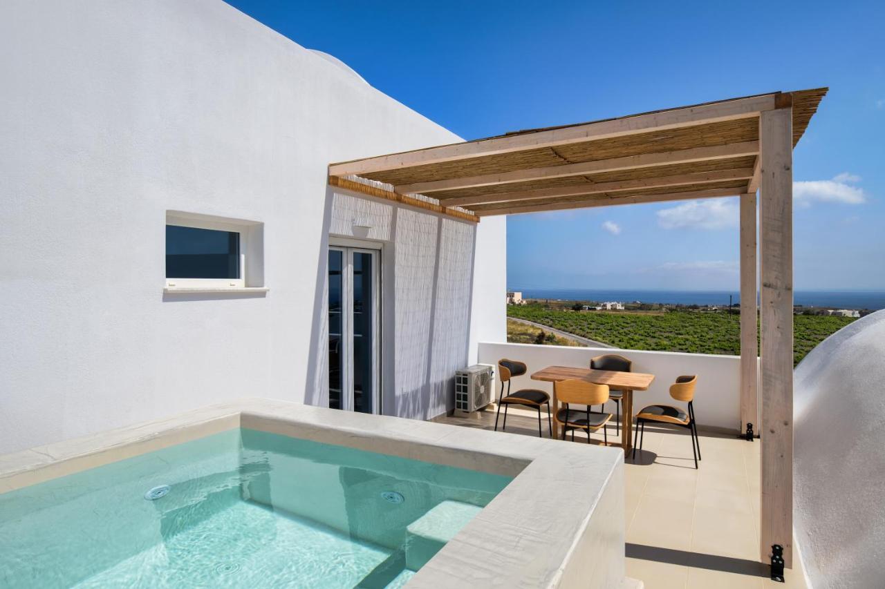 Aelia Luxury Suites Karterados  Exterior photo Pergola over a swimming pool
