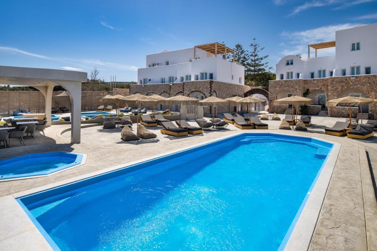 Aelia Luxury Suites Karterados  Exterior photo The hotel's swimming pool