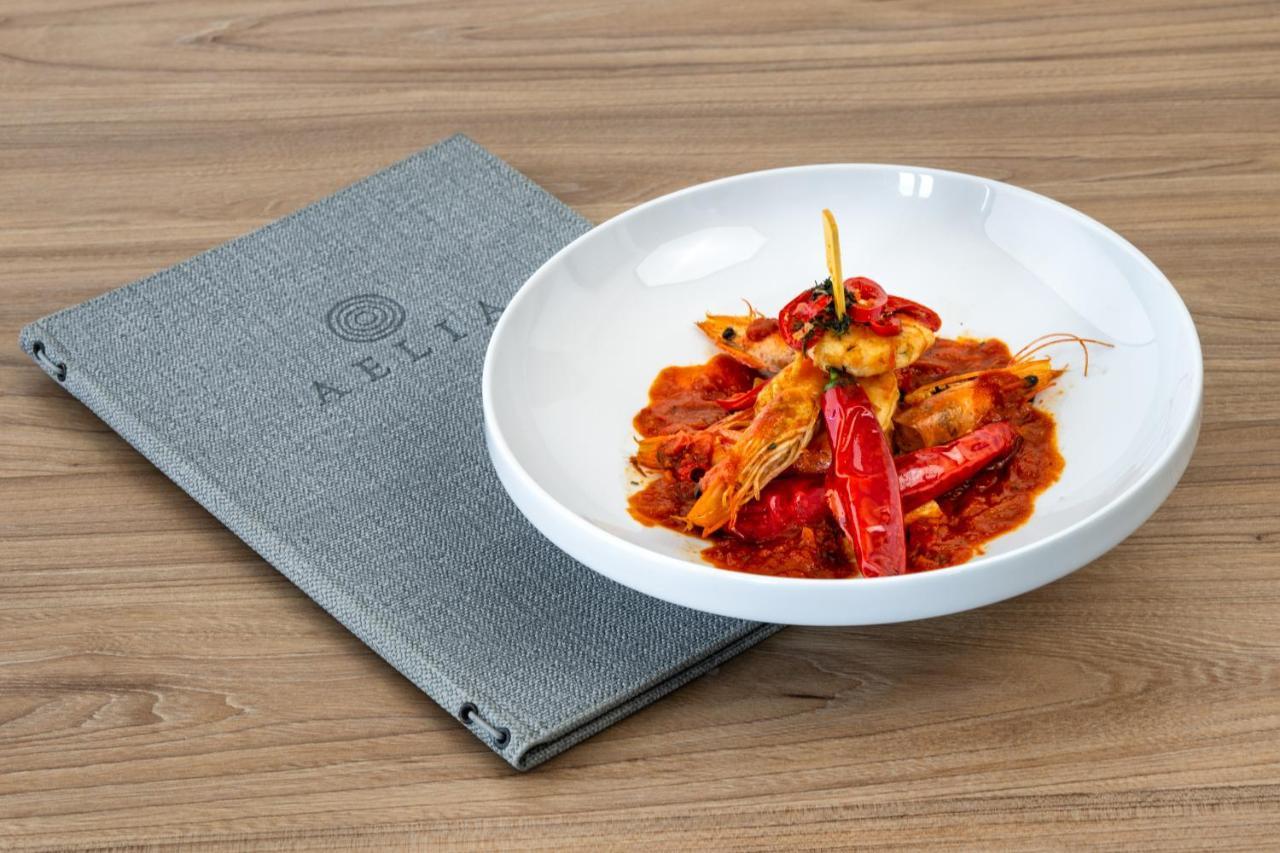 Aelia Luxury Suites Karterados  Exterior photo A dish from the restaurant