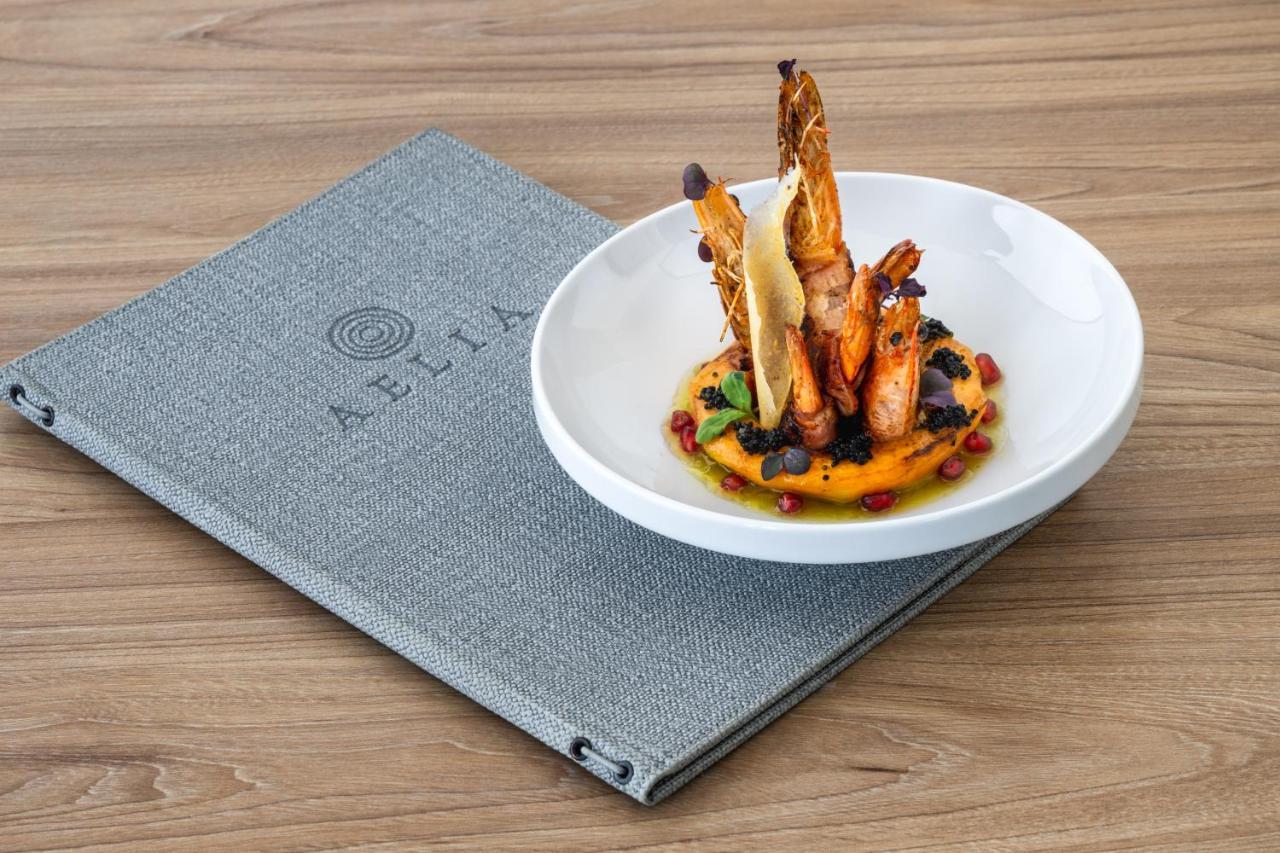 Aelia Luxury Suites Karterados  Exterior photo A dish from ELIX